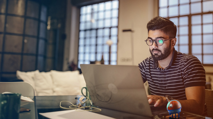Professional working on laptop